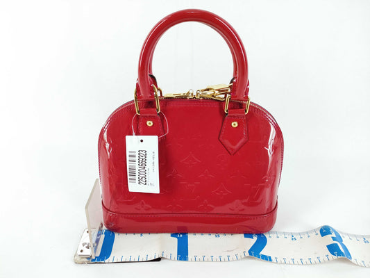 LOUIS VUITTON Vernis Louis Vuitton Alma BB Handbag with Serial Number