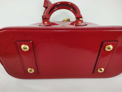 LOUIS VUITTON Vernis Louis Vuitton Alma BB Handbag with Serial Number