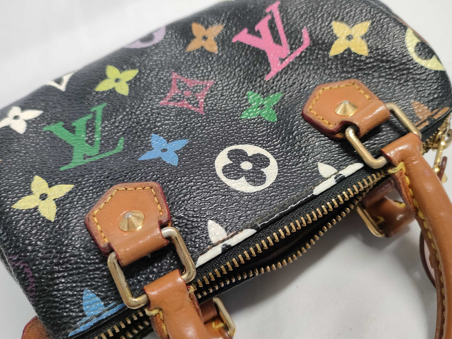 LOUIS VUITTON RFID verification failed. Serial number verification failed. Monogram Multicolore Louis Vuitton Monogram Mini Speedy Handbag Noir.