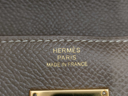 HERMES Kelly Wallet Long Etoupe Gold Hardware C Stamp Wallet