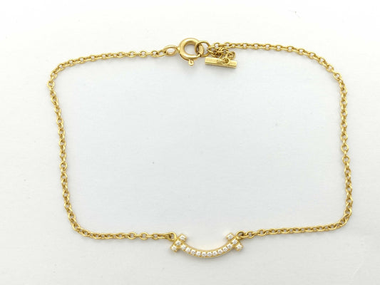 Tiffany & Co. T Smile Mini Diamond Bracelet/Bangle in Yellow Gold and Au750, 1.8g 