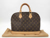 LOUIS VUITTON Louis Vuitton Monogram Alma Monogram Handbag