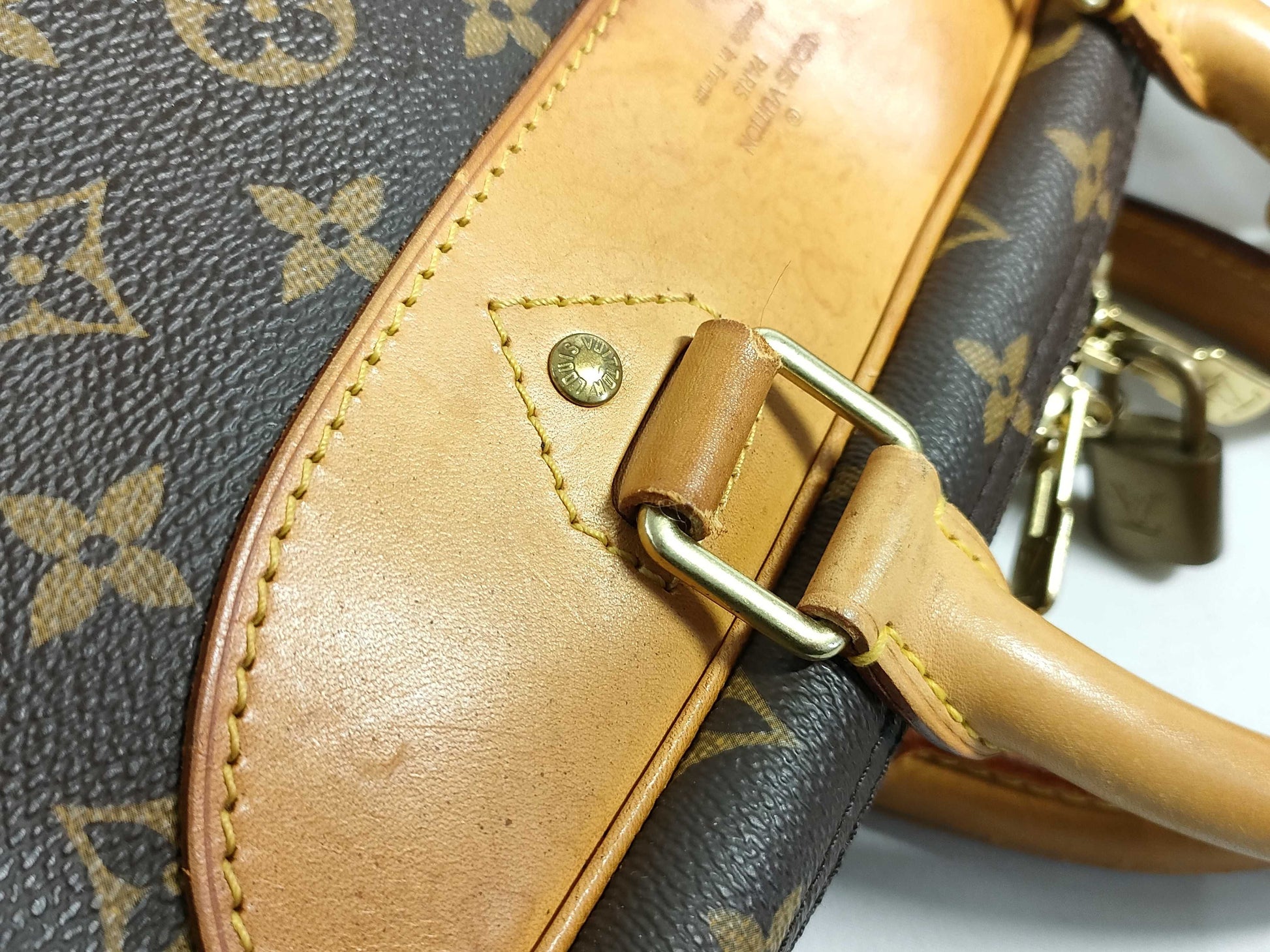 LOUIS VUITTON RFID verification failed. VI1918 Monogram Louis Vuitton Evasion Handbag.