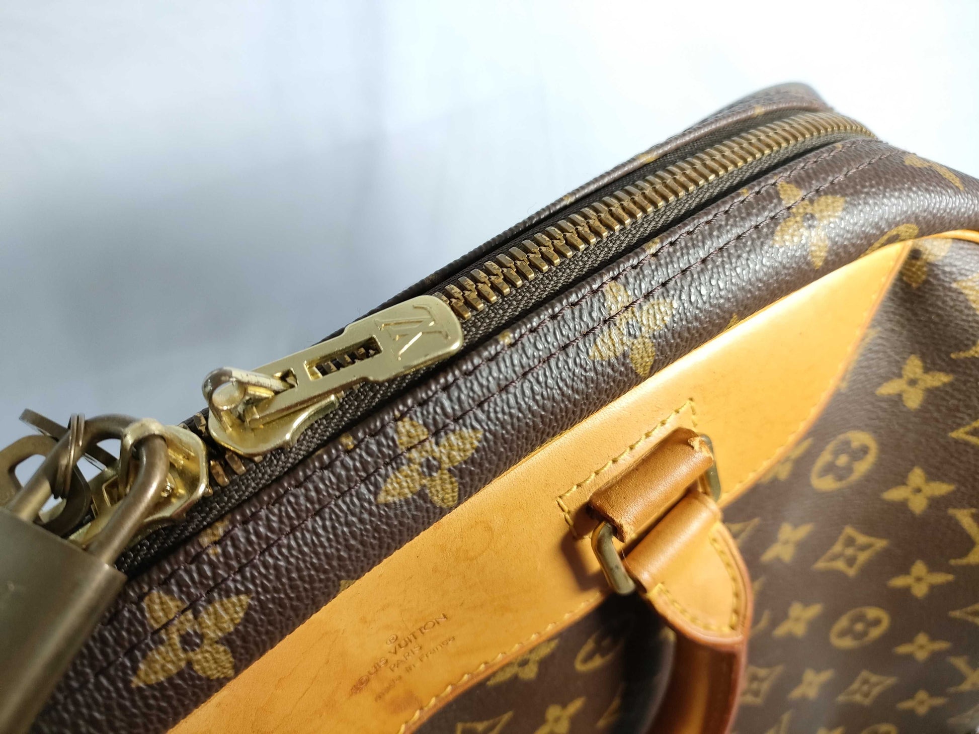 LOUIS VUITTON RFID verification failed. VI1918 Monogram Louis Vuitton Evasion Handbag.
