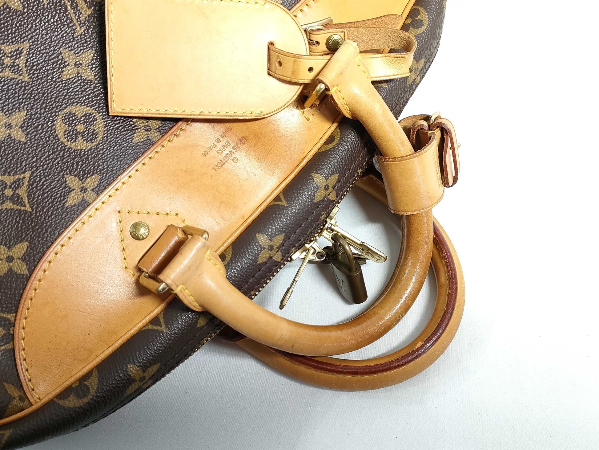 LOUIS VUITTON RFID verification failed. VI1918 Monogram Louis Vuitton Evasion Handbag.