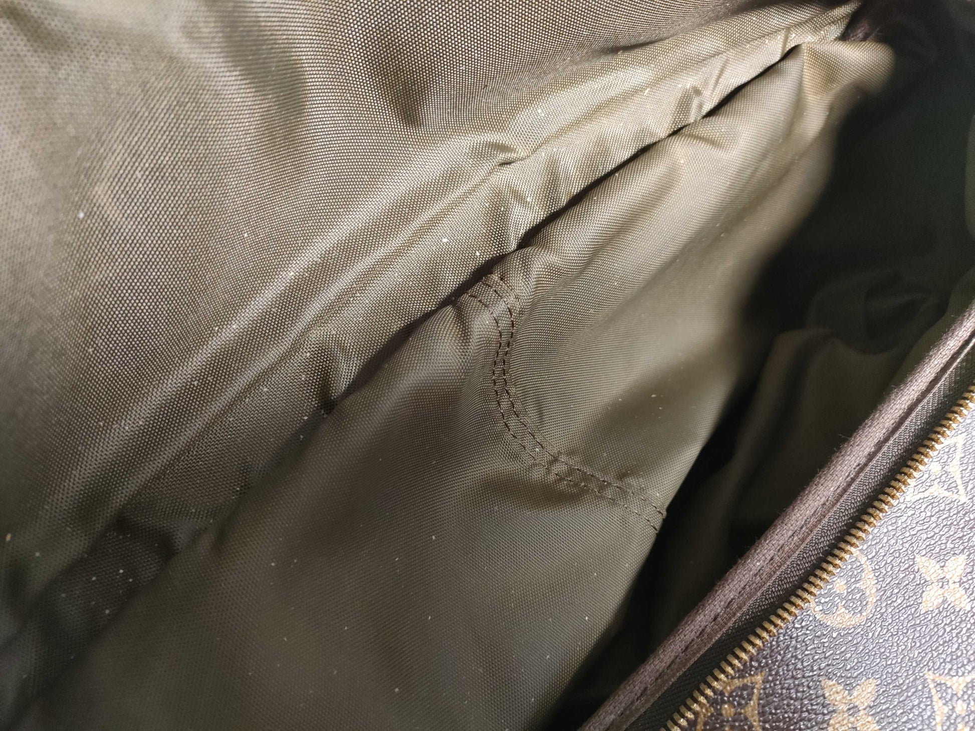 LOUIS VUITTON RFID verification failed. VI1918 Monogram Louis Vuitton Evasion Handbag.