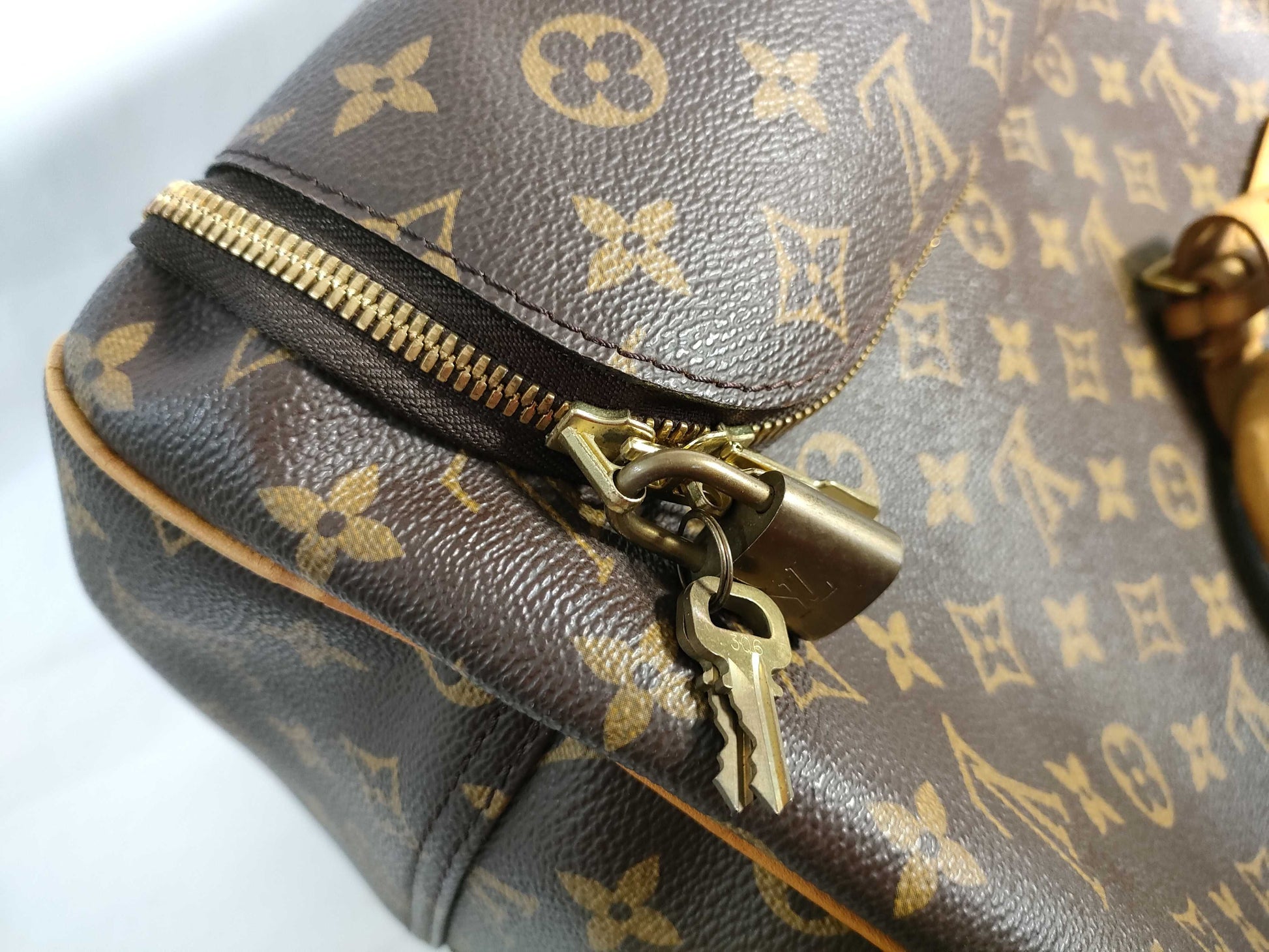 LOUIS VUITTON RFID verification failed. VI1918 Monogram Louis Vuitton Evasion Handbag.