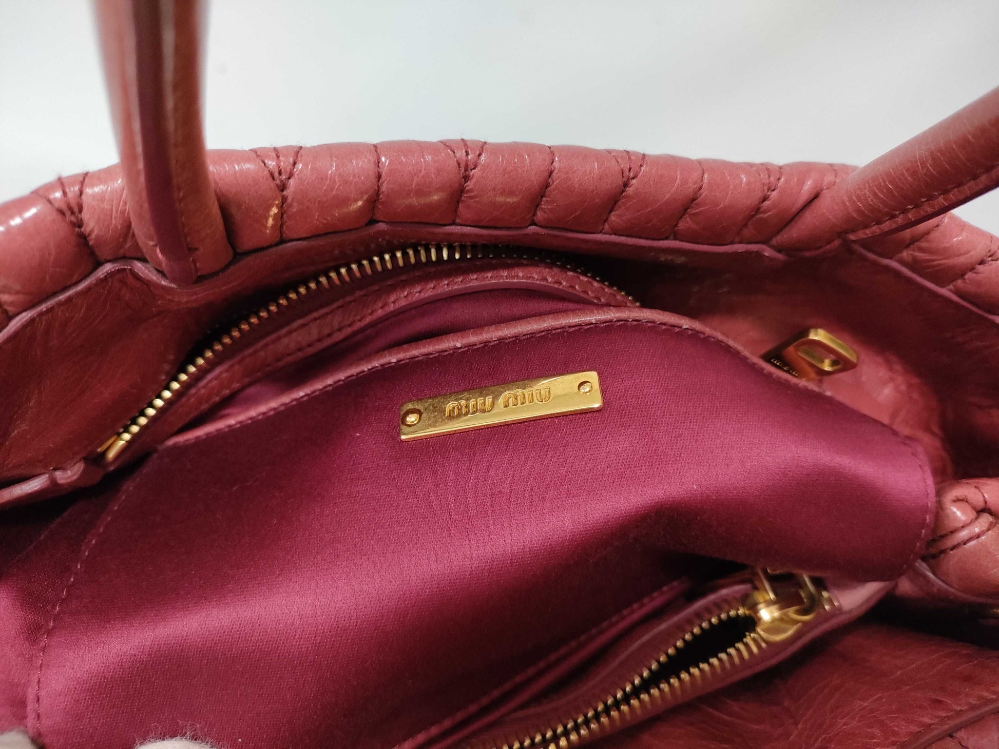 Miu Miu 2-way shoulder bag with Matelasse logo and leather handbag