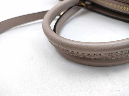 LOUIS VUITTON RFID Verified, Serial Number Unverifiable, Monogram Empreinte Grand Palais MM M45833 Beige Handbag, RFID Enabled