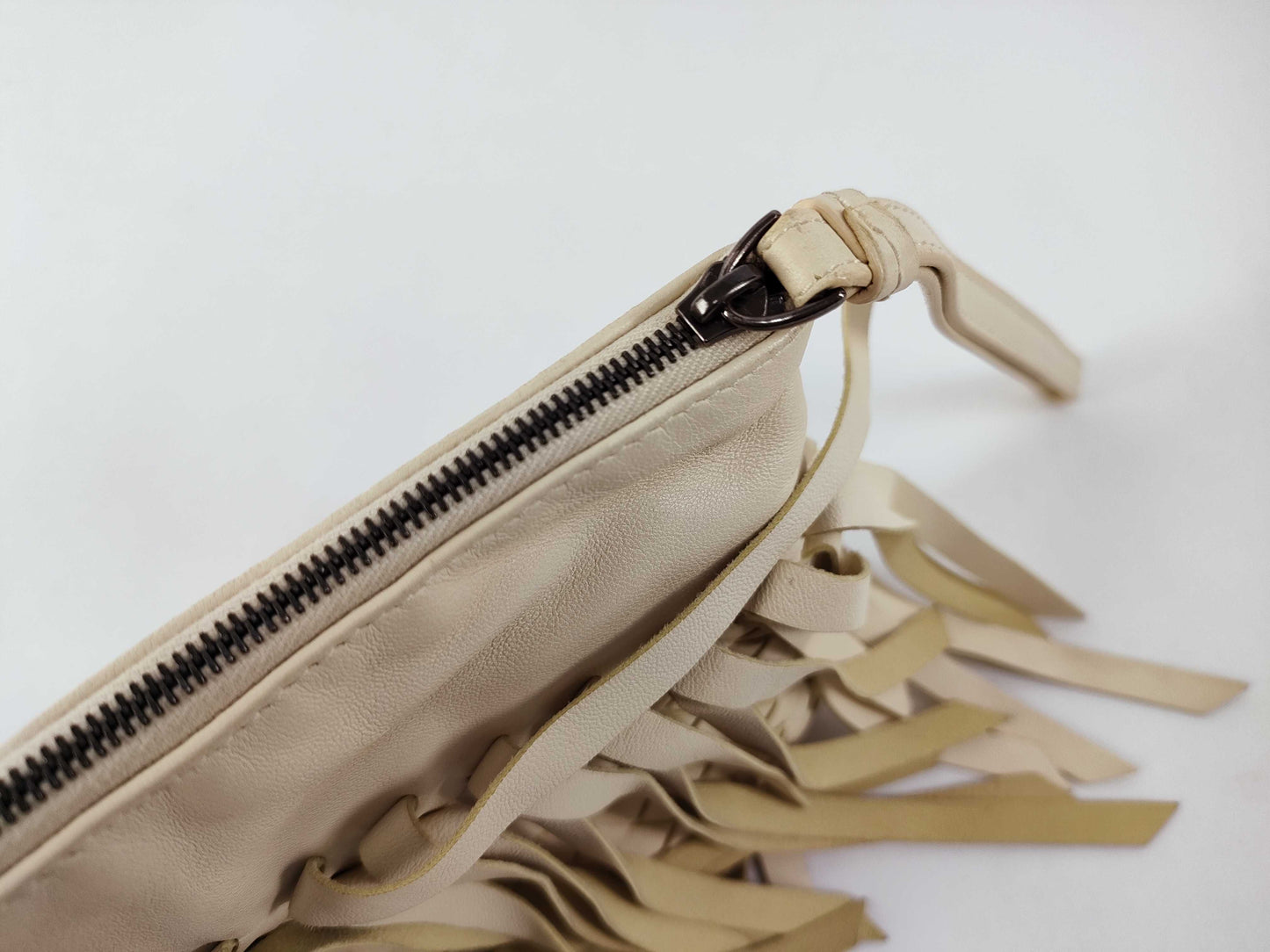 BOTTEGA VENETA Intrecciato Fringed Leather Clutch Bag White