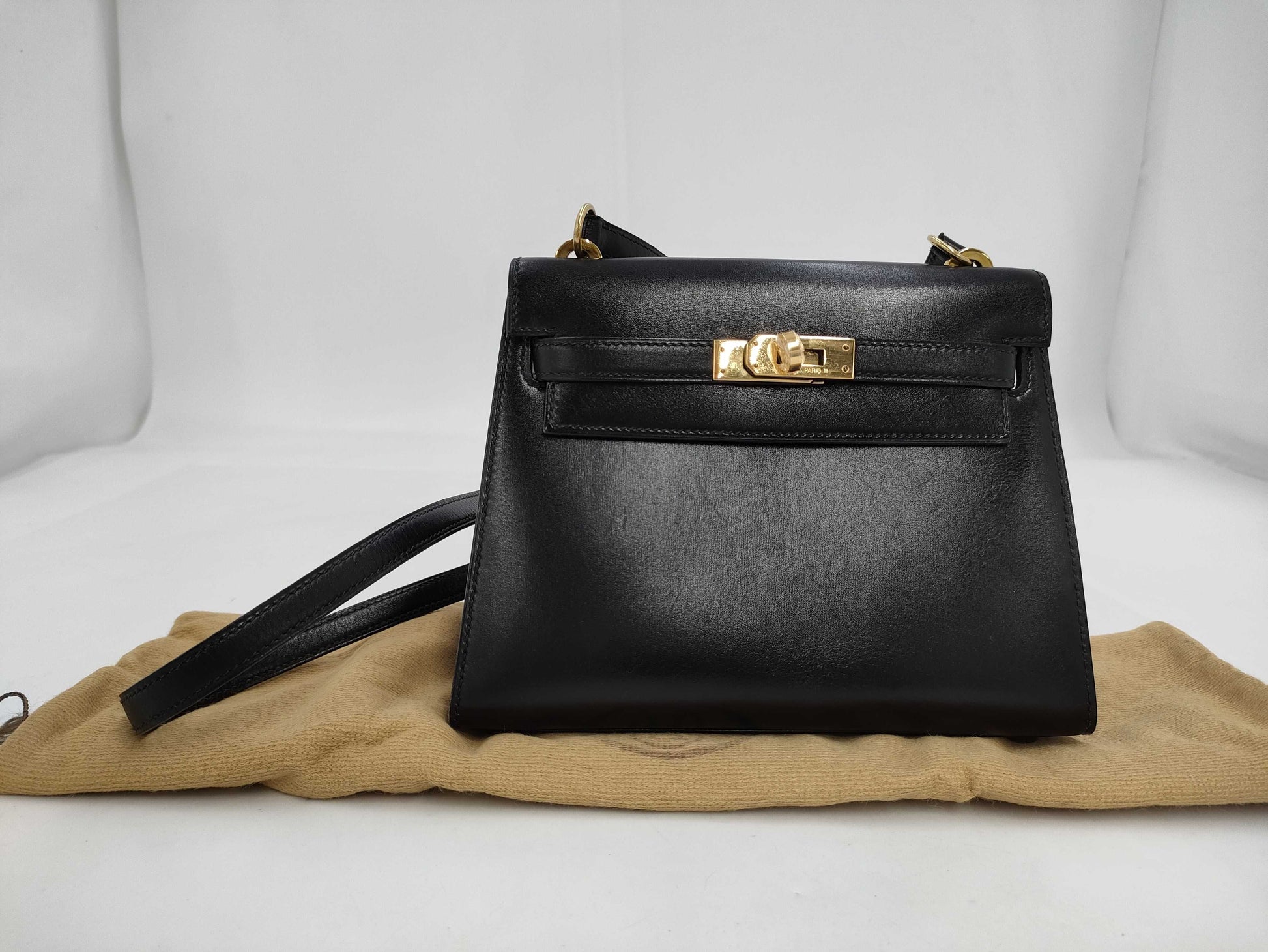 HERMES Mini Kelly Shoulder Bag in Black Box Calf Leather with Gold Hardware and Turn Lock Protection Seal