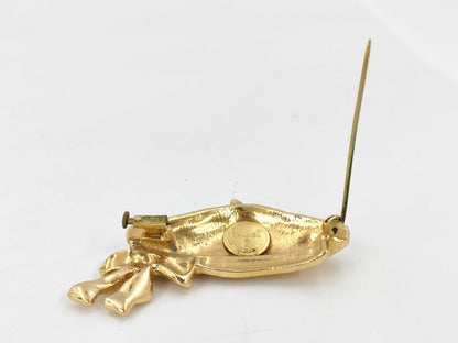 CHANEL beret brooch