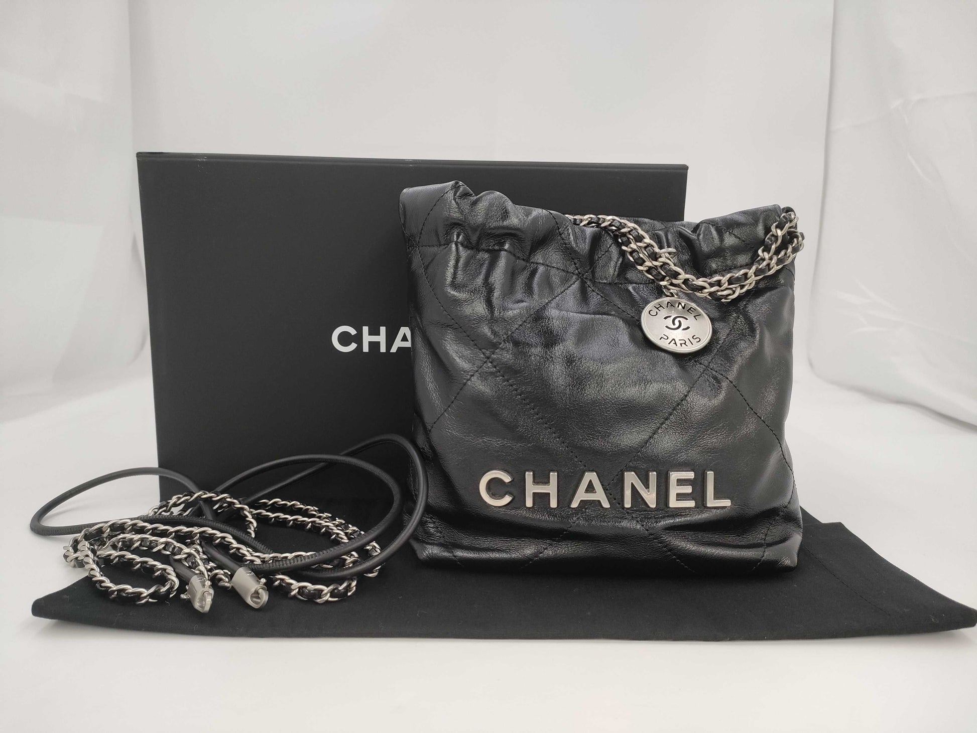 CHANEL Chanel 22 Mini Black Shoulder Bag with Silver Hardware and GP Serial Plate 