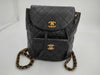 CHANEL Matelasse Lambskin Chain Backpack in Black with Gold Hardware