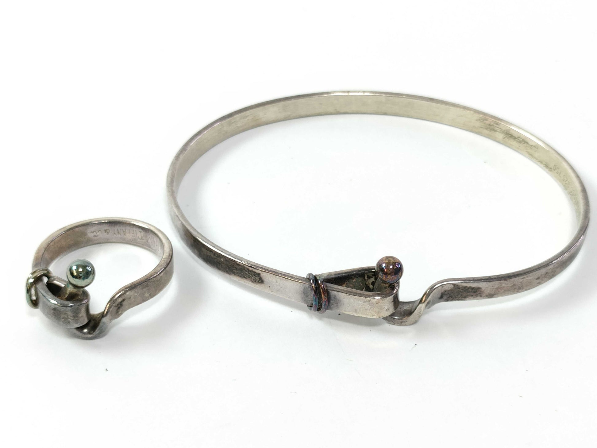 Tiffany & Co. Tiffany Love Knot Press + Ring Accessories Summary Accessories Summary 