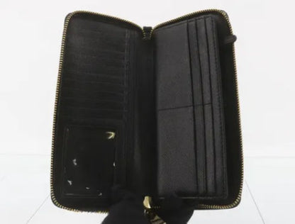 Michael Kors long wallet with round zipper