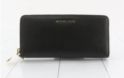 Michael Kors long wallet with round zipper