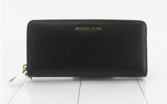Michael Kors long wallet with round zipper