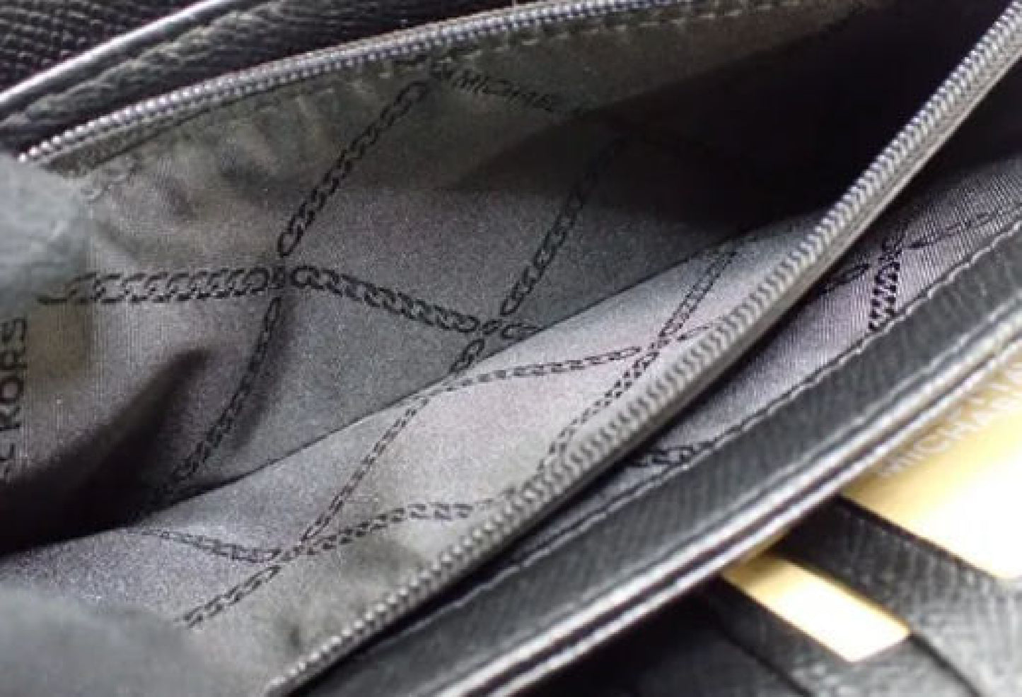 Michael Kors long wallet with round zipper