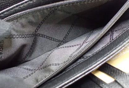 Michael Kors long wallet with round zipper