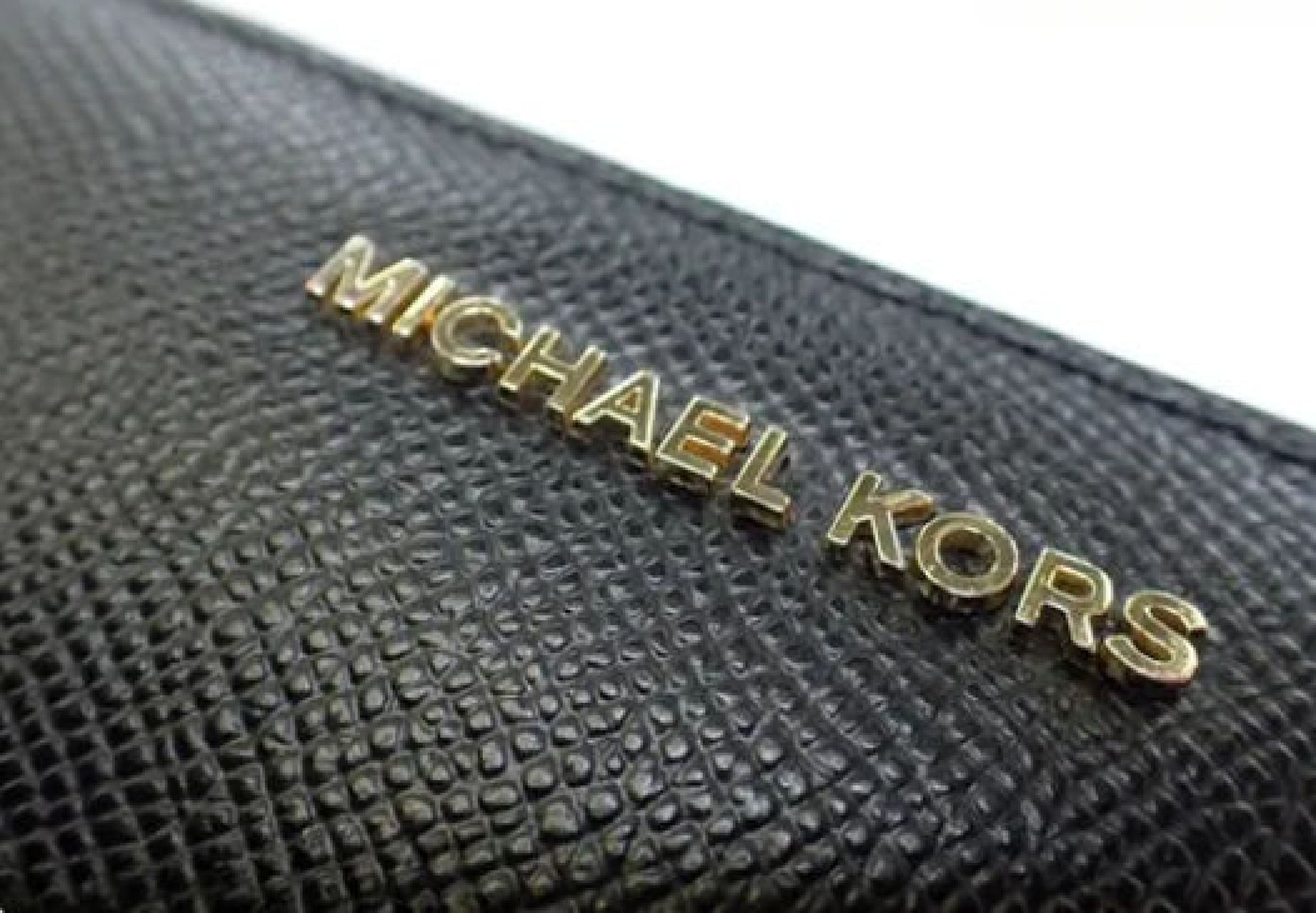Michael Kors long wallet with round zipper