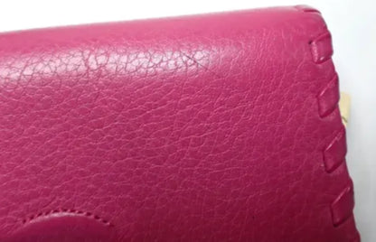 Tory Burch dark pink wallet