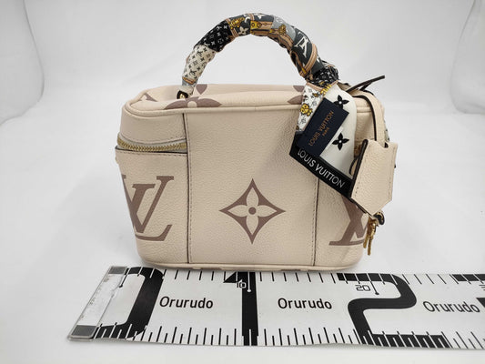 LOUIS VUITTON M45599 Monogram Empreinte Vanity PM Handbag with RFID Ready Scarf, Strap, Cloche, Padlock, Two Keys, and Dust Bag