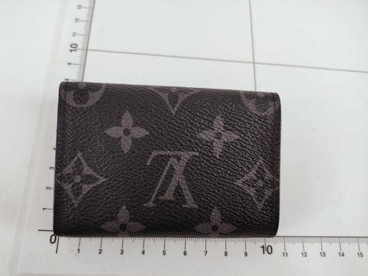 LOUIS VUITTON Monogram Eclipse Reverse Tri-fold Wallet