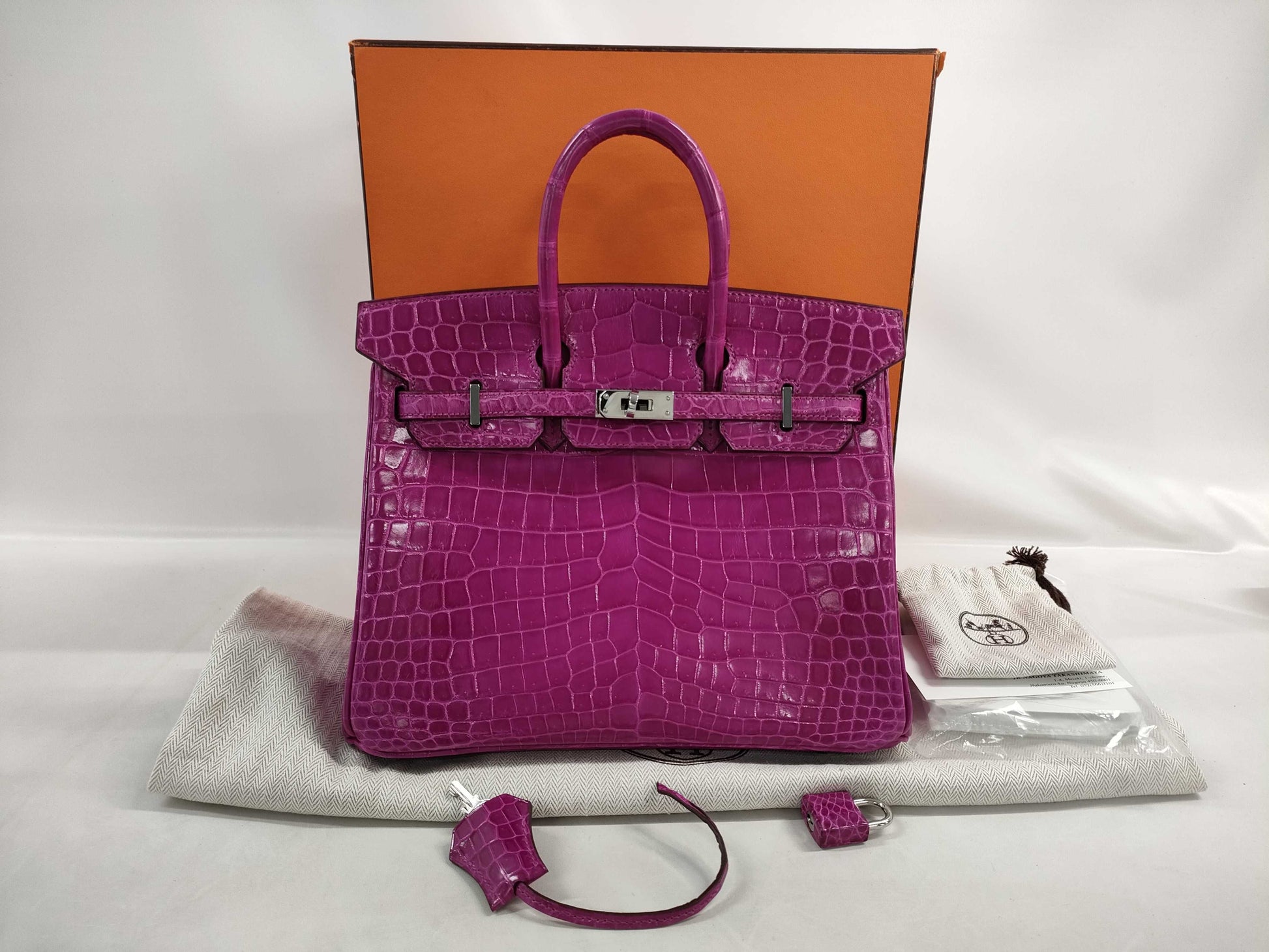 HERMES Birkin 25 Niloticus Rose Scheherazade Handbag with Silver Hardware and Q Stamp