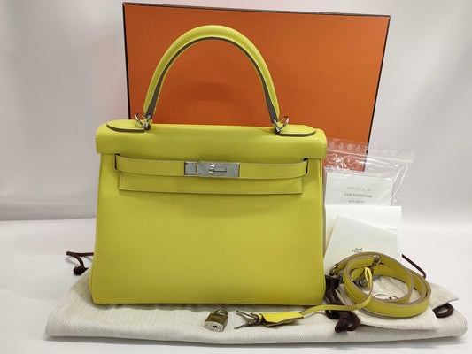 HERMES Kelly 28 Swift/Lemon Yellow Handbag