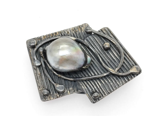 Pearl-like brooch, silver color