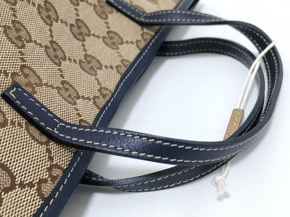 GUCCI GG Canvas Gucci GG Canvas Canvas and Leather Handbag Beige and Navy 271101 Handbag