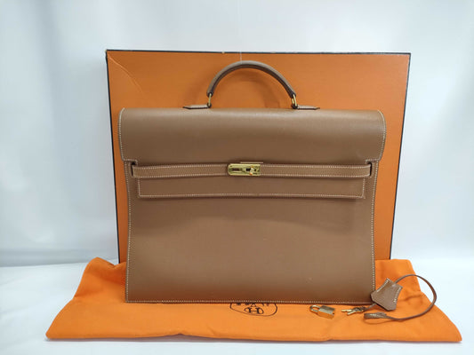 HERMES Kelly Depeche 38 Handbag in Gold with Gold Hardware, Size B