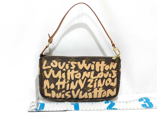 LOUIS VUITTON Monogram Graffiti Pochette Accessoires M92193 AR0041 Handbag