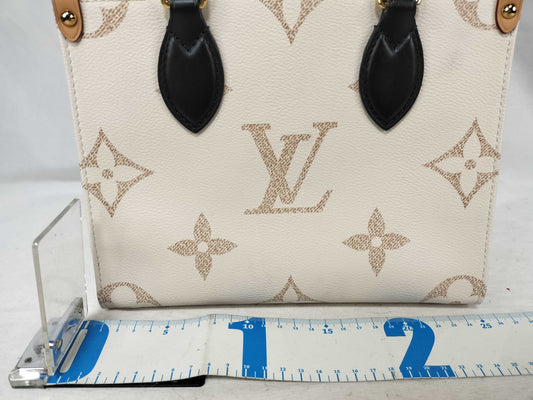 LOUIS VUITTON LV Monogram Dune On the Go PM Handbag, 2-Way, M24533, RFID Enabled, Shoulder Strap and Pouch Included, White/Black