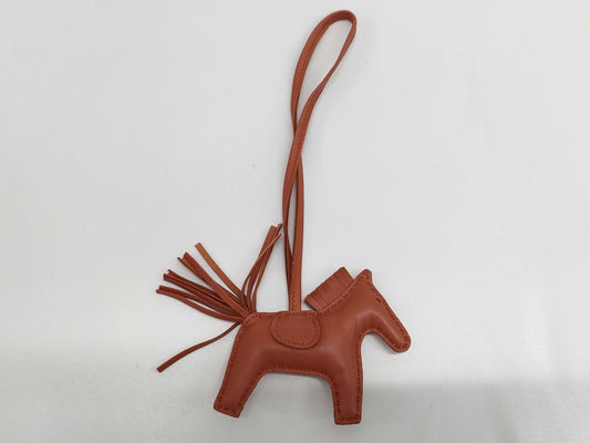 HERMES Rodeo PM Carnelian Z Stamp Charm