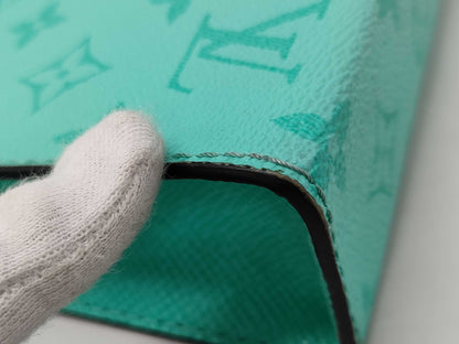 LOUIS VUITTON Taiga Rama Gaston Shoulder Bag