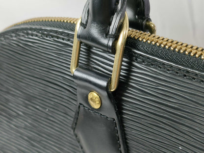 LOUIS VUITTON Epi Alma Noir Handbag