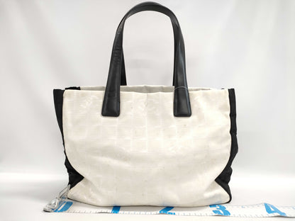 CHANEL New Travel Tote MM Nylon/Leather Black/Ivory Tote Bag