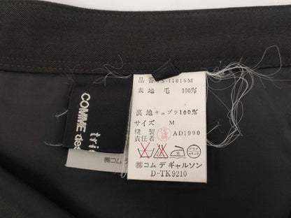 COMME des GARCONS toricot COMME des GARCONS early archive deformed wool tight skirt in black, size M