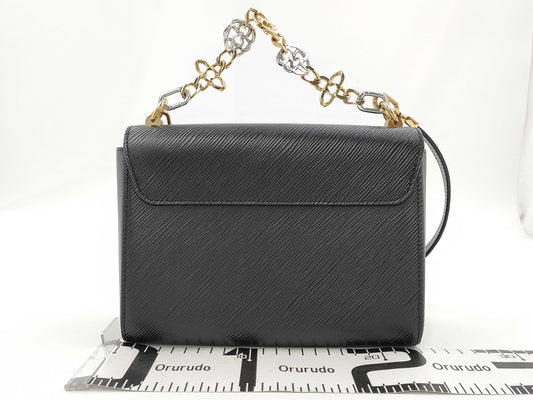 LOUIS VUITTON Epi LV Twist MM Epi Handbag