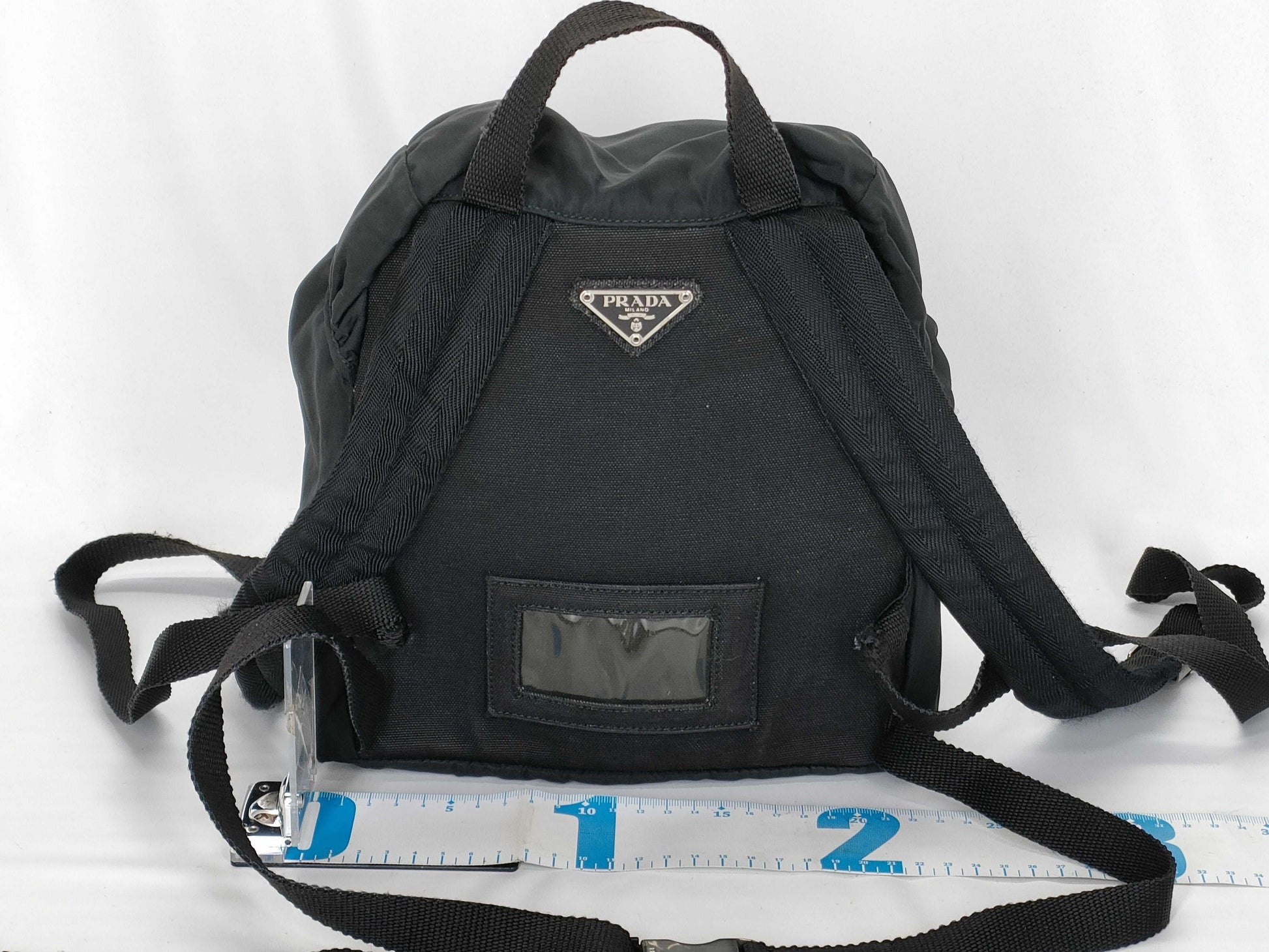 PRADA Nylon Backpack in Black with Triangle Logo Plate