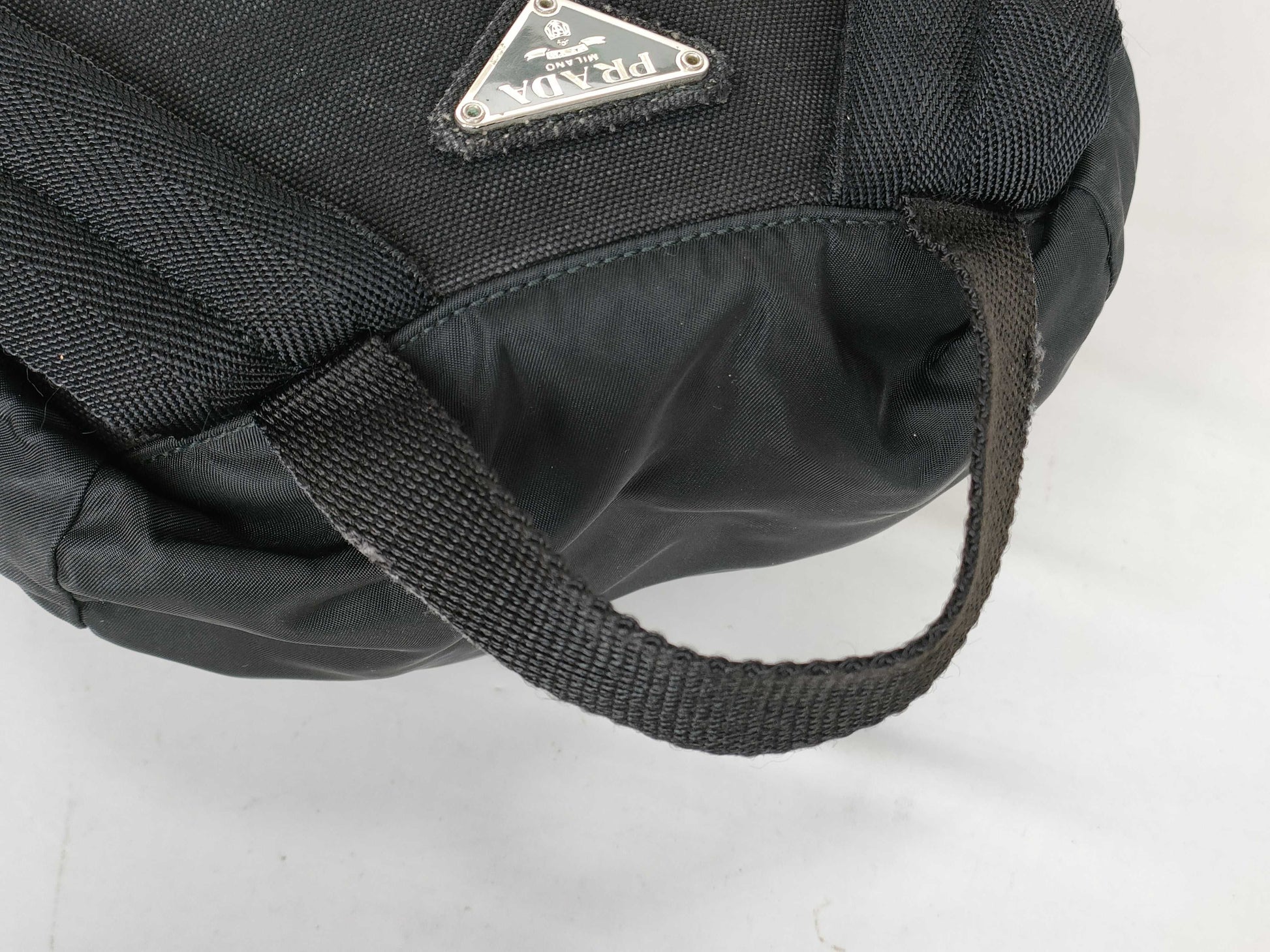 PRADA Nylon Backpack in Black with Triangle Logo Plate