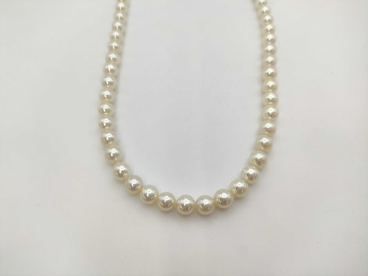 Semi-round pearl necklace, diameter approximately 6.9mm-7.4mm, sterling silver, 38.9g .
