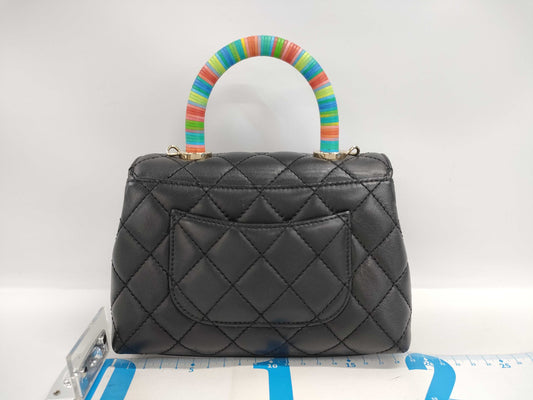 CHANEL Matelasse Coco Handle XXS Lambskin Black Handbag, No. 31