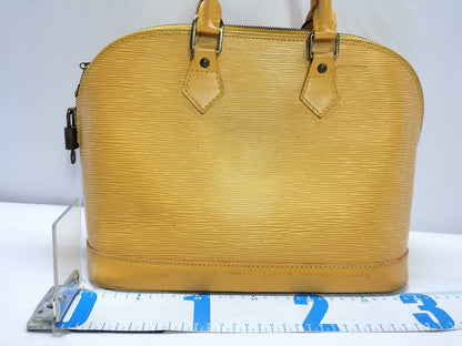 LOUIS VUITTON Epi Alma Handbag
