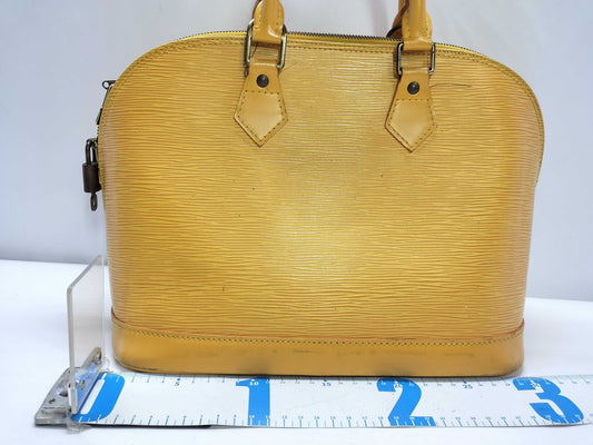 LOUIS VUITTON Epi Alma Handbag