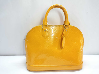 LOUIS VUITTON Epi Louis Vuitton Vernis Alma PM Jaune Passion Handbag M91695 MI1112