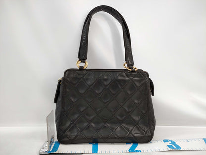 CHANEL Matelasse Lambskin Handbag in Black with Gold Hardware