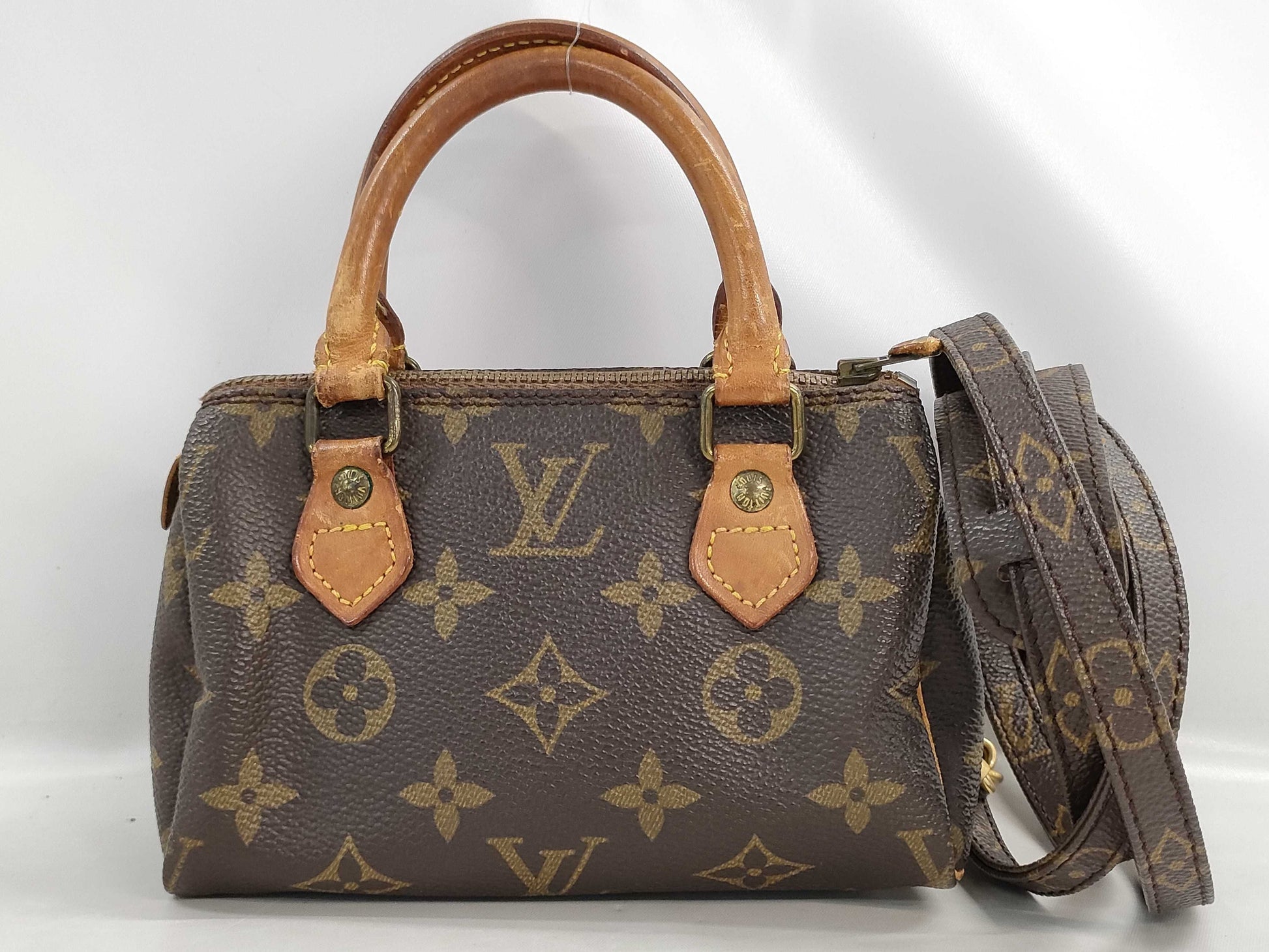 LOUIS VUITTON Monogram Mini Speedy Handbag with Strap